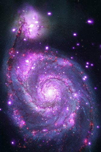 The Whirlpool galaxy seen in both optical (red, green and blue) and X-ray (purple) light. Image Credit: X-ray: NASA/CXC/Wesleyan Univ./R.Kilgard, et al; Optical: NASA/STScI Read more: http://www.universetoday.com/112332/amazing-new-x-ray-image-of-the-whirlpool-galaxy-shows-it-is-dotted-with-black-holes/#ixzz33snF4D1V 