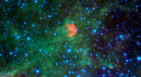 This infrared image from NASA's Spitzer Space Telescope shows N103B -- all that remains from a supernova that exploded a millennium ago in the Large Magellanic Cloud, a satellite galaxy 160,000 light-years away from our own Milky Way. Image credit: NASA/JPL-Caltech/Goddard