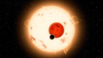 Artist conception of a rocky planet in a binary star-system, one of which is a red dwarf. (NASA/JPL-Caltech/R. Hurt via Getty Images)