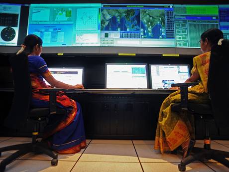 Scientists from the Indian Space Research Organisation work in the Indian Regional Navigational Satellite System control room at the Indian Deep Space Network (Credit: AP)
