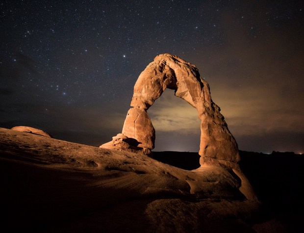 Delicate Arch and many other gigantic arches in the US are made of the stuff. It is a "locked sand", whose angular grains can catch on each other.(Credit: Brad Goldpaint/Aurora Open/Corbis)