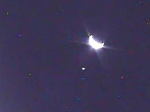 A zoomed-in image of Earth from the perspective of NASA’s Lunar Crater Observation and Sensing Satellite (LCROSS). The small dot below it is the moon. Credit: NASA Ames