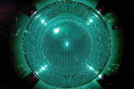 The Borexino neutrino detector uses a sphere filled with liquid scintillator that emits light when excited. This inner vessel is surrounded by layers of shielding and by about 2,000 photomultiplier tubes to detect the light flashes.(Credit: Borexino Collaboration)