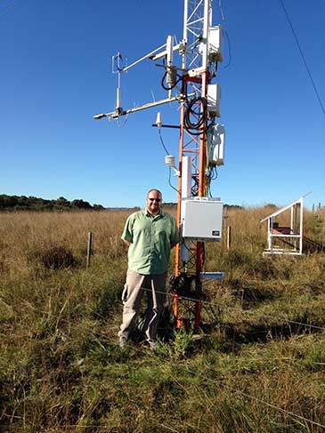 Dr Rosolem with the cosmic-ray soil moisture sensor installed at the the Federal University of Santa Maria SulFlux site in Brazil 
