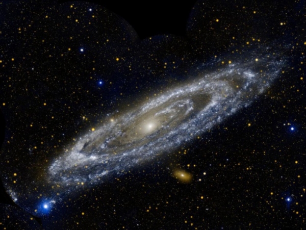 Andromeda is twice as massive as the Milky Way. Scientists say that Andromeda has twice the mass, made of dark matter, than the Milky Way. (Credit: Phil Plait)