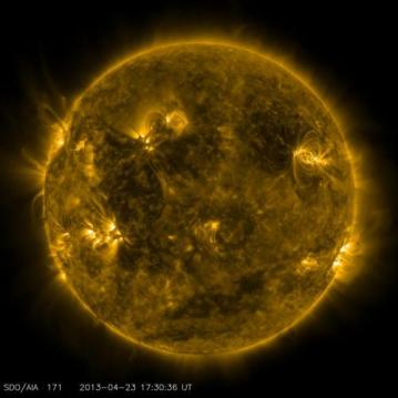 NASA's Solar Dynamics Observatory captured this image of what the sun looked like on April 23, 2013, at 1:30 p.m. EDT when the EUNIS mission launched. EUNIS focused on an active region of the sun, seen as bright loops in the upper right in this picture. (Credit: NASA/SDO)