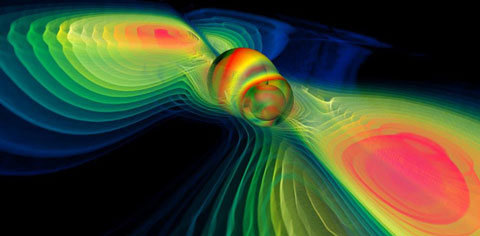 A simulation of two colliding black holes. Colors reflect the variation of gravitational waves. (Credit: Werner Benger/NASA Blueshift)