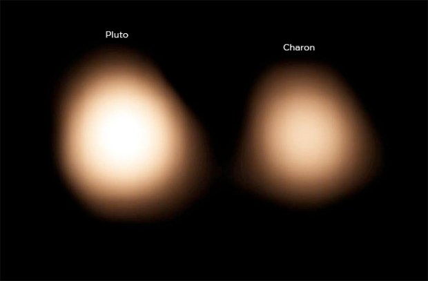 The cold surface of Pluto and its largest moon Charon as seen with ALMA on July 15, 2014. (Credit: /AUI/NSF)
