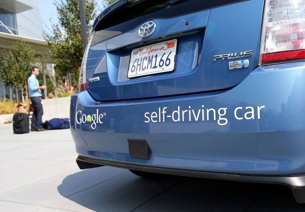  Google Inc. has conducted more than 300,000 miles of driverless car testing with vehicles. They navigate by collecting real-time sensor data and comparing it to pre-loaded maps that specify exact locations for roads and signs, while adapting to obstacles such as people and cars. (Credit: Justin Sullivan/Getty Images, Kearns)