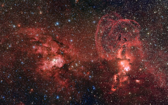 This mosaic of images from the Wide Field Imager on the MPG/ESO 2.2-metre telescope at ESO’s La Silla Observatory in Chile shows two dramatic star formation regions in the southern Milky Way. (Credit: ESO/G. Beccari)