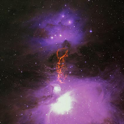 Radio/optical composite of the Orion Molecular Cloud Complex showing the OMC-2/3 star-forming filament. GBT data is shown in orange. Uncommonly large dust grains there may kick-start planet formation. (Credit: S. Schnee, et al.; B. Saxton, B. Kent (NRAO/AUI/NSF)