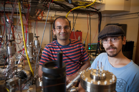Siddharth Karkare, left, and Laurent Boulet '14 in the Newman Hall photocathode research lab. (Credit: Lindsay France/University)