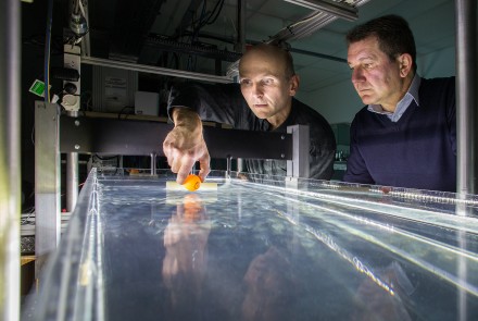 Dr Horst Punzmann (left) and Professor Michael Shats test their wave-generated tractor beam. (Credit: Stuart Hay)