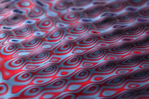 "The key question is whether a real quantum dynamics, of the general form suggested by de Broglie and the walking drops, might underlie quantum statistics," Bush said. "While undoubtedly complex, it would replace the philosophical vagaries of quantum mechanics with a concrete dynamical theory," said  John Bush of MIT. (Credit: D. Harris/MIT, M. Byrne)