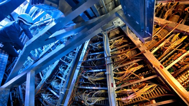 As time ticks down to the restart of the Large Hadron Collider, scientists are making sure their detectors run like clockwork.Photo by Antonio Saba, CERN