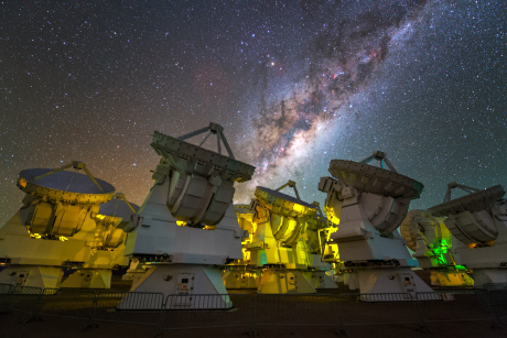 The vibrant, starry stream of the Milky Way frames radio telescopes of the Atacama Large Millimeter/submillimeter Array - known as the ALMA Observatory - in Chile’s Atacama Desert. (Credit: Y. Beletsky/ESO)