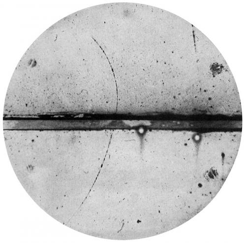 Photograph of a cloud chamber showing the first discovered positron. (Credit: Carl D. Anderson)