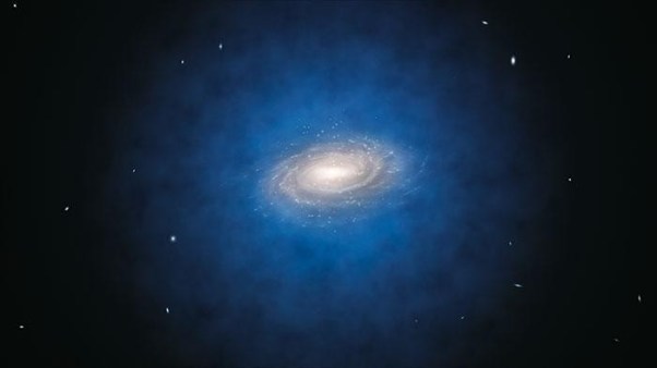 A new measurement of dark matter in the Milky Way has revealed there is half as much of the mysterious substance as previously thought.  The above is an artist's impression of the Milky Way and its dark matter halo (shown in blue, but in reality invisible). Credit: ESO/L. Calçada