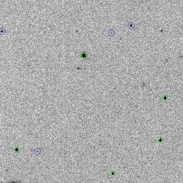 In this sequence assembled from three discovery images taken about 30 minutes apart, the comet can be seen as a black speck moving toward the lower right near the center of the image and a faint tail can be seen moving along with the comet on its right side. Similar to a photo negative, black and white have been inverted in the image to make objects easier to spot. (Credit: Tomas Vorobjov)