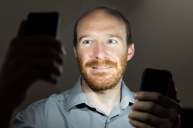 Professor Justin Vandenbroucke leads the development of the DECO app. (Credit: Jeff Miller/UW-Madison)