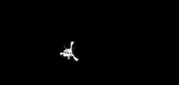 Rosetta’s OSIRIS narrow-angle camera captured this parting shot of the Philae lander after separation. (Credit: ESA/Rosetta/MPS for OSIRIS Team MPS/UPD/LAM/IAA/SSO/INTA/UPM/DASP/IDA)