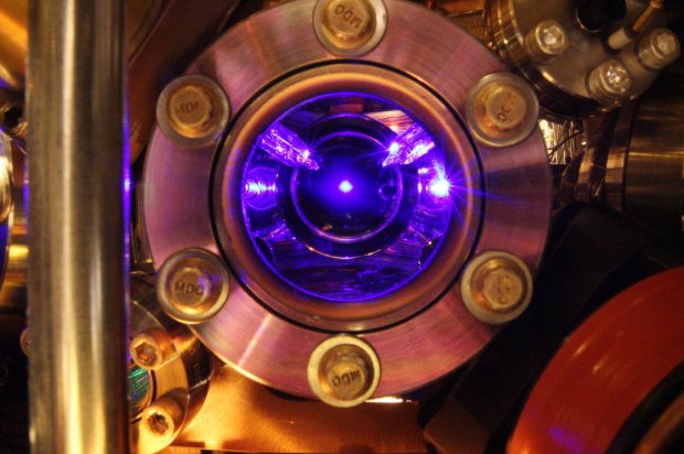  Strontium atoms floating in the center of this photo are the heart of the world's most precise clock. The clock is so exact that it can detect tiny shifts in the flow of time itself. (Credit: Ye group, Brad Baxley/JILA)