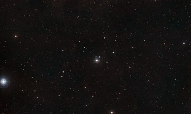 Wide-field image of NGC 7714 -- In this image, the bright star you can see on the left is around a billion times closer than the galaxy.