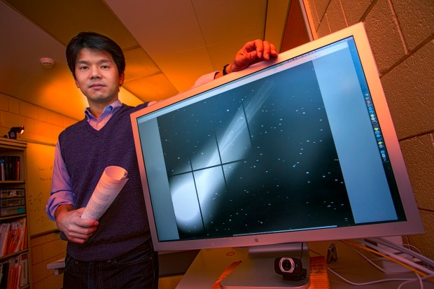 Stony Brook University’s Jin Koda alongside an image of the rapidly changing plasma tail of the comet C/2013 R1 (Lovejoy). 